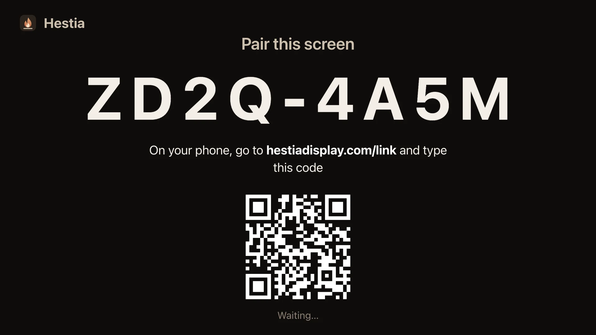 The TV pairing screen with a large code and a QR code.